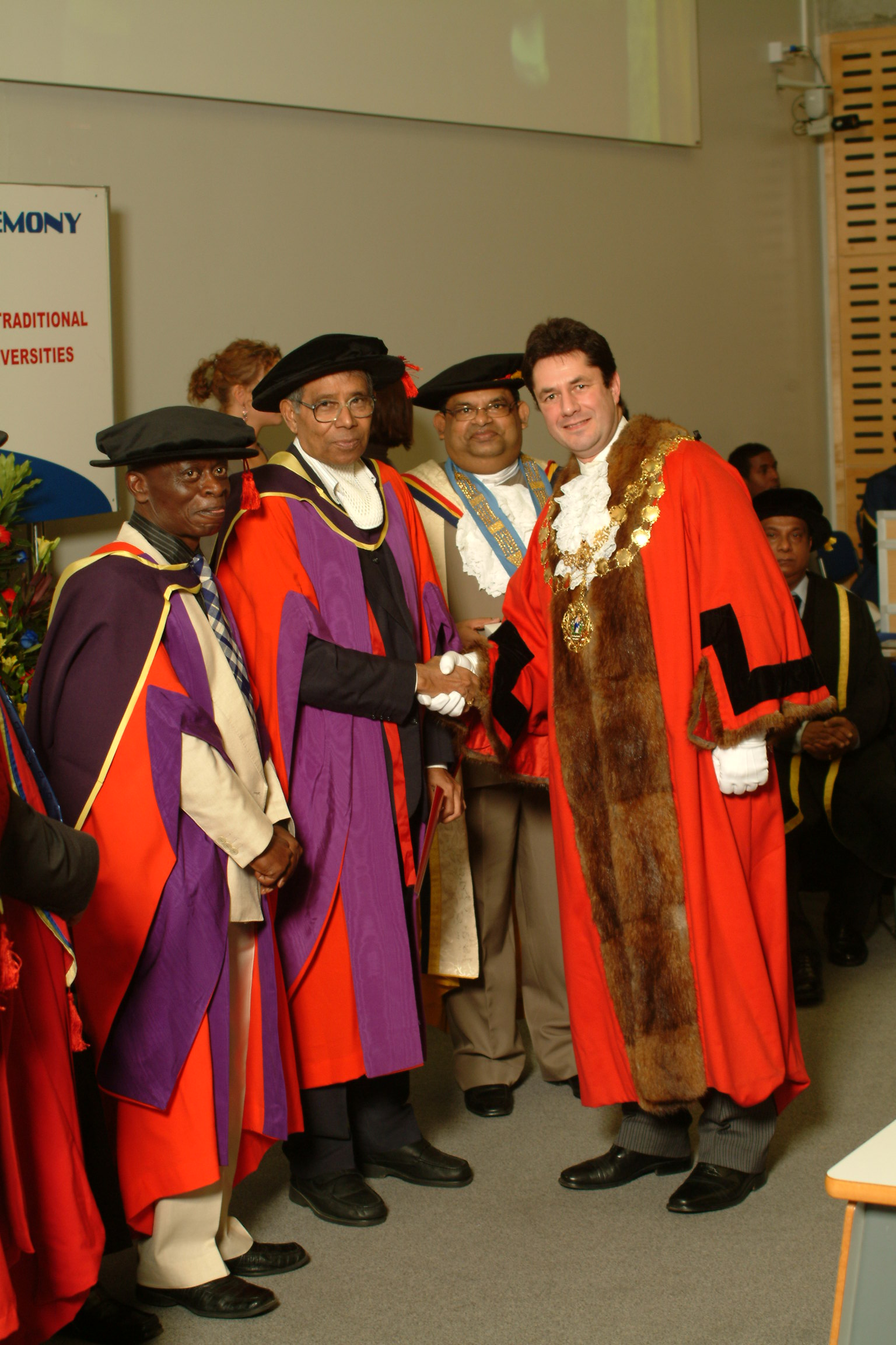 Depty Mayor Westminster Congratulating Hon Doc recipients